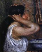 kvinna som kammar sig Pierre Auguste Renoir